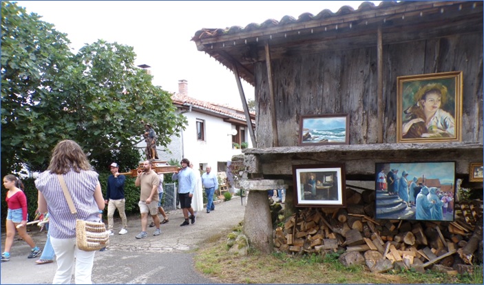 San Roque procesionando ante el h�rreo con obras art�sticas