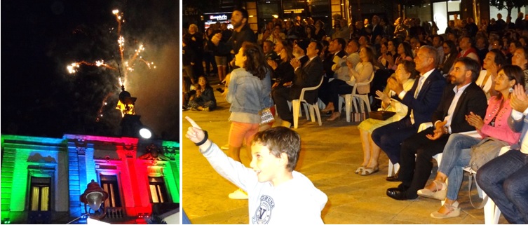 Arabela Garca y Gerardo Fabin (representacin cabranesa, primeros por la derecha), y Alejandro Vega (ms a la izquierda), observan y aplauden la pirotecnia y la iluminacin del Ayuntamiento con los colores de la estrofa (verdes, azules y colorados). / F