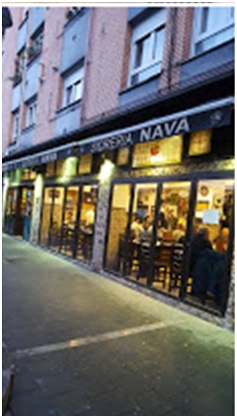 La Sidrería Nava está en la Plaza de la Serena, 1, de Gijón (no lejos del centro comercial Los Fresnos y del Parque de Los Pericones, en El Llano) y destaca en cocina asturiana, pescados y mariscos de vivero propio, según su página promocional. / De la we